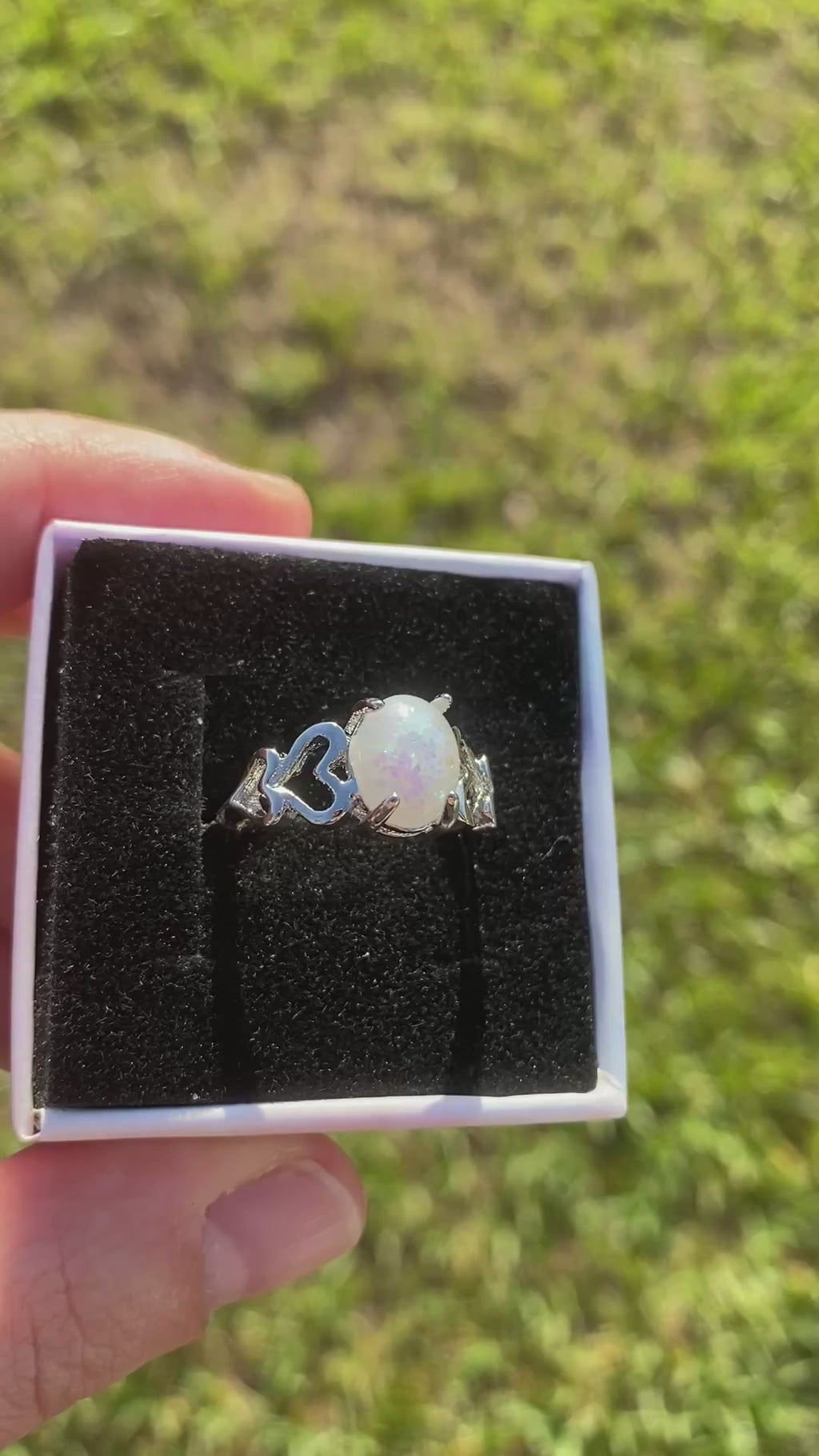 Opal ring with heart band